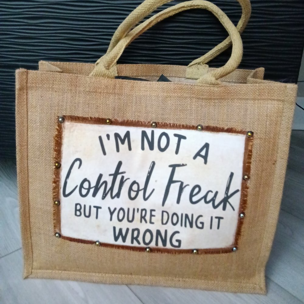 New jute tote embellished with a jewel trimmed saying "I am Not A Control Freak"